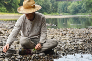 Duncan forest bathing on river bank